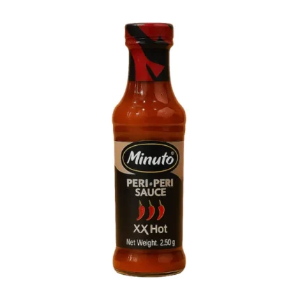 Minuto Peri-Peri Sauce XX Hot bottle – fiery hot sauce on orange background
